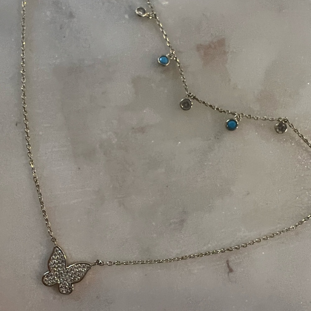 Crystal butterfly and aqua gem double layer gold necklace